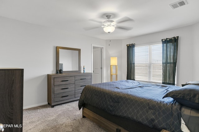 13142 Emerald Isle St, El Paso, TX 79928 - bedroom with light carpet and ceiling fan