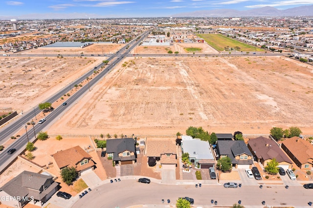 2909 Pino Triste Dr, El Paso, TX 79938 - aerial view of property and surrounding area with a mountain backdrop and nearby suburban area