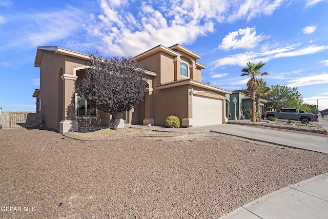 2909 Pino Triste Dr, El Paso, TX 79938 - view of front of property with concrete driveway, stucco siding, and an attached garage