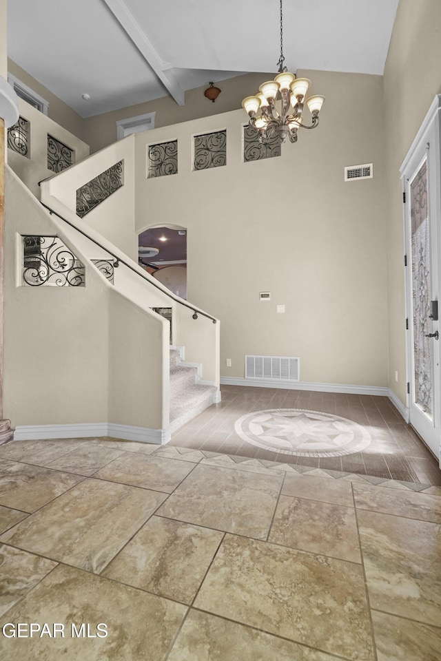 2909 Pino Triste Dr, El Paso, TX 79938 - entrance foyer featuring stairway, high vaulted ceiling, a chandelier, and beamed ceiling