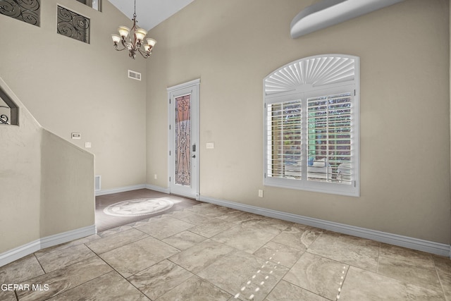 2909 Pino Triste Dr, El Paso, TX 79938 - entryway featuring a chandelier and a towering ceiling