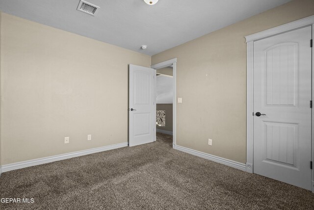 2909 Pino Triste Dr, El Paso, TX 79938 - unfurnished bedroom with carpet floors and baseboards