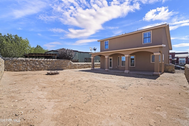 2909 Pino Triste Dr, El Paso, TX 79938 - back of property with stucco siding and a fenced backyard