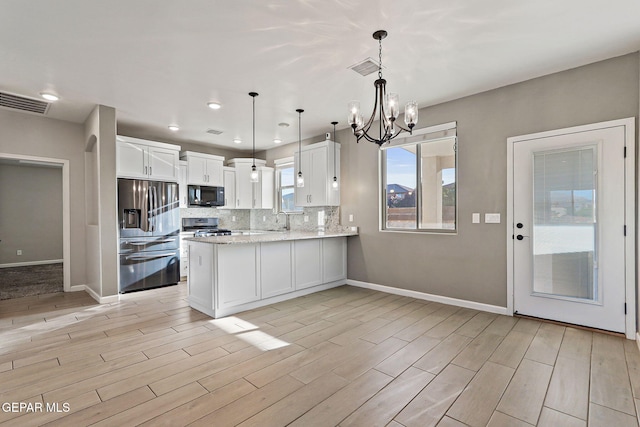 6037 Vicente Gomez Ln, El Paso, TX 79932 - kitchen featuring black microwave, stainless steel fridge with ice dispenser, range, a sink, and baseboards