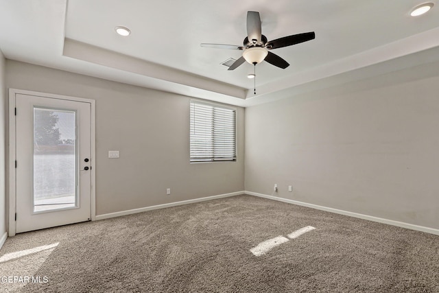 6037 Vicente Gomez Ln, El Paso, TX 79932 - carpeted spare room with a tray ceiling, a ceiling fan, baseboards, and recessed lighting