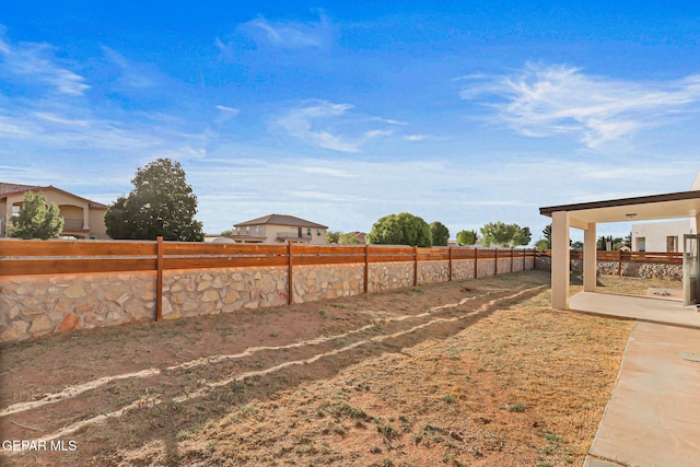 6037 Vicente Gomez Ln, El Paso, TX 79932 - fenced yard with a patio