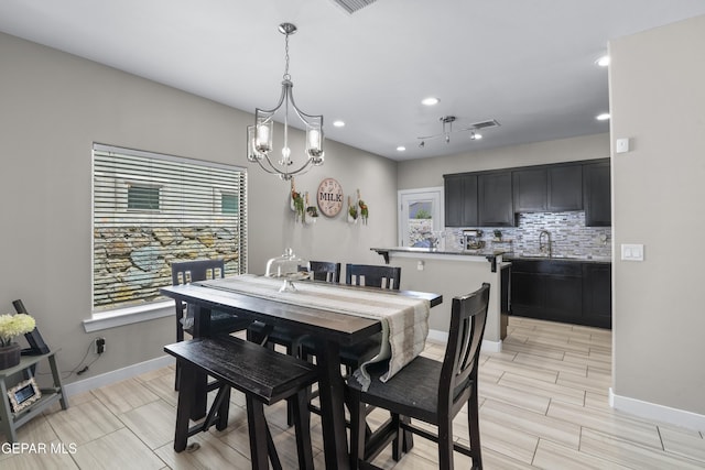 3452 David Palacio Dr, El Paso, TX 79938 - dining room featuring recessed lighting, a chandelier, and wood finish floors