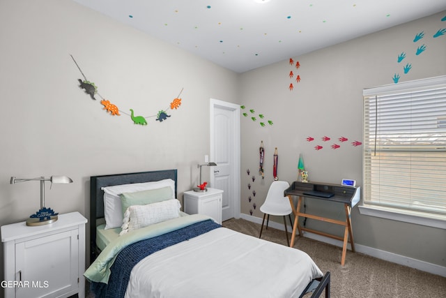 3452 David Palacio Dr, El Paso, TX 79938 - bedroom featuring light colored carpet and baseboards