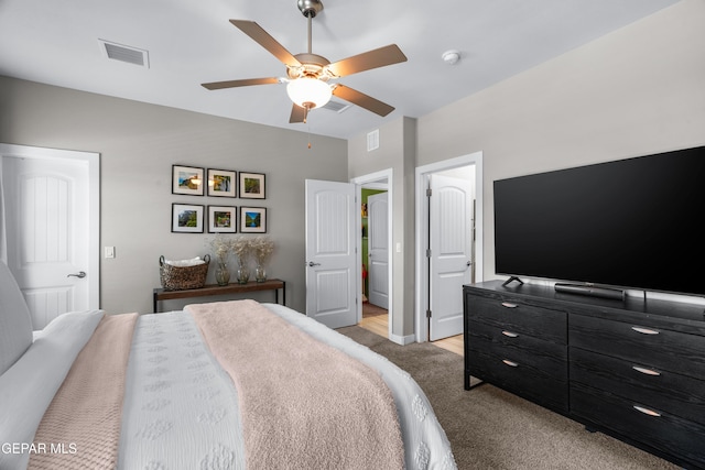 3452 David Palacio Dr, El Paso, TX 79938 - bedroom featuring light carpet and ceiling fan