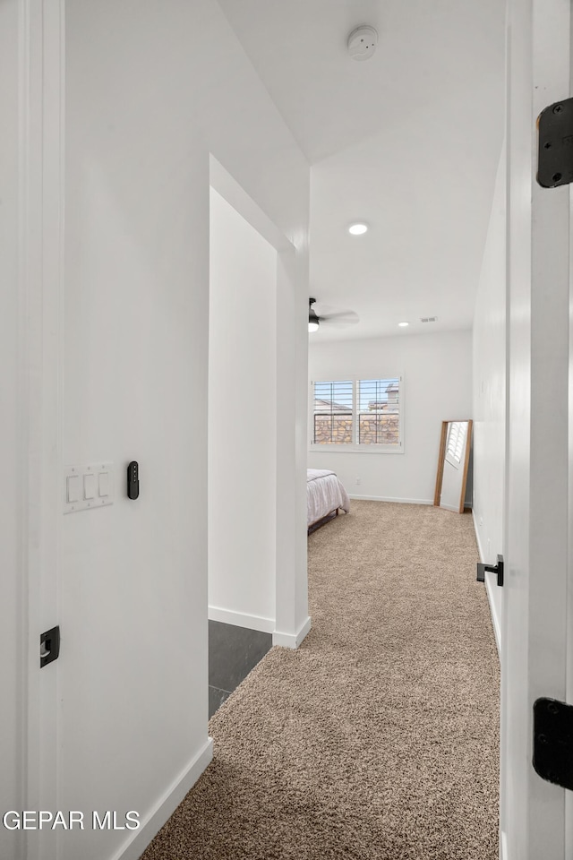 1453 Indigo Sky St, El Paso, TX 79928 - hallway featuring dark colored carpet, baseboards, and recessed lighting