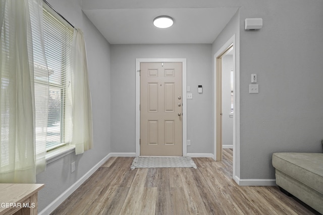 14236 Rattler Point Dr, El Paso, TX 79938 - entrance foyer featuring wood finished floors and baseboards