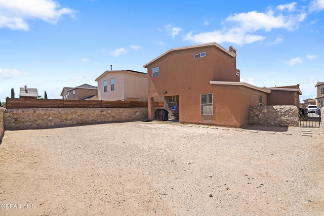 14236 Rattler Point Dr, El Paso, TX 79938 - back of house featuring stucco siding