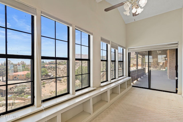 3134 Mesa Verde Ln, El Paso, TX 79904 - unfurnished sunroom featuring carpet flooring and high vaulted ceiling