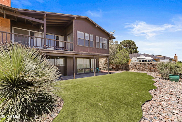 3134 Mesa Verde Ln, El Paso, TX 79904 - back of house featuring a yard and a patio area