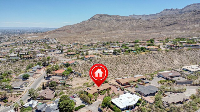 3134 Mesa Verde Ln, El Paso, TX 79904 - aerial overview of property's location featuring a mountain backdrop and nearby suburban area