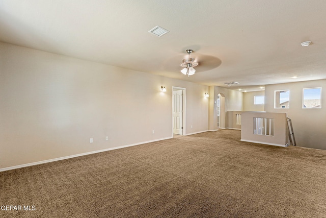 14840 Tim Hardaway, El Paso, TX 79938 - unfurnished room with carpet, a ceiling fan, baseboards, and a smoke detector