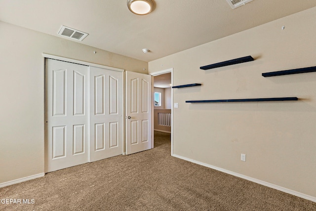 14840 Tim Hardaway, El Paso, TX 79938 - unfurnished bedroom with carpet flooring, baseboards, and a closet