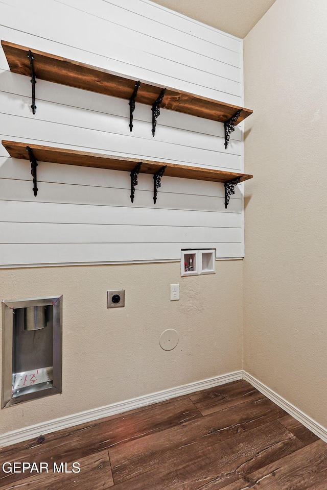 14840 Tim Hardaway, El Paso, TX 79938 - laundry area featuring dark wood finished floors, baseboards, washer hookup, and hookup for a gas dryer
