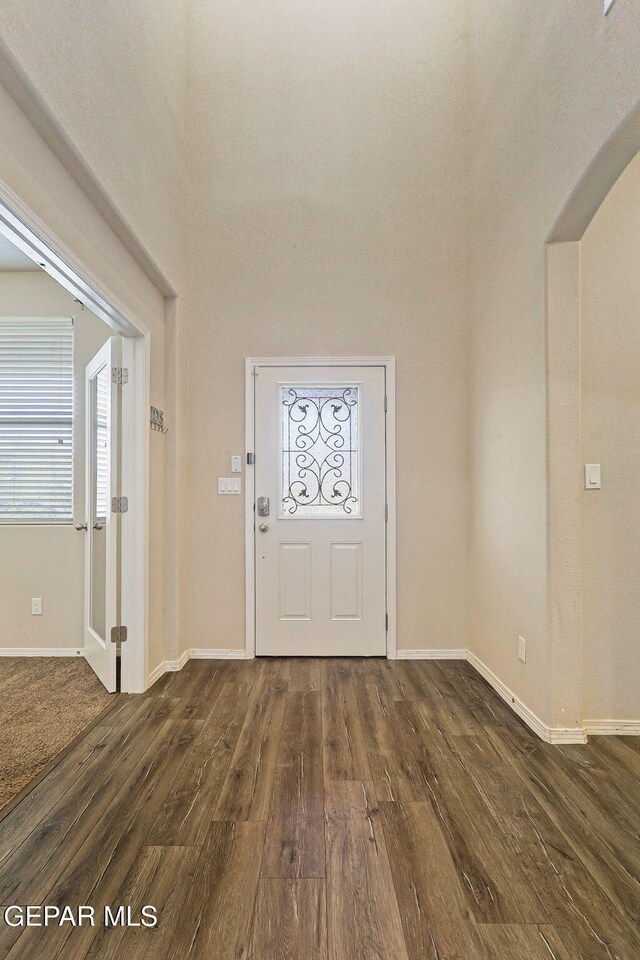 14840 Tim Hardaway, El Paso, TX 79938 - entrance foyer with dark wood-style flooring, plenty of natural light, and baseboards