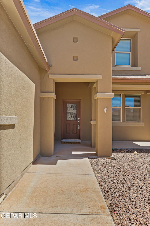 14840 Tim Hardaway, El Paso, TX 79938 - property entrance with stucco siding