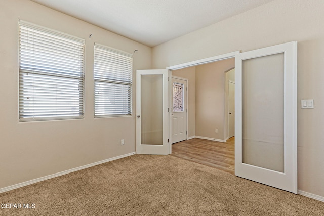 14840 Tim Hardaway, El Paso, TX 79938 - unfurnished bedroom with carpet floors and baseboards