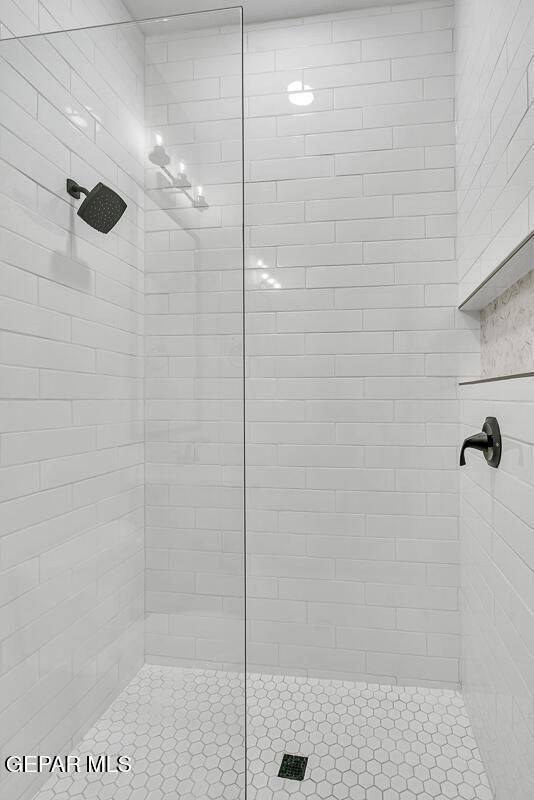 248 Emerald Storm Pl, El Paso, TX 79928 - full bath featuring a tile shower