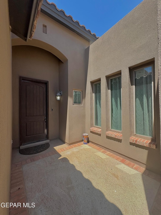 12217 Chapel Hill Rd, El Paso, TX 79928 - view of exterior entry featuring stucco siding