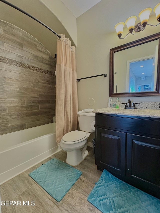 12217 Chapel Hill Rd, El Paso, TX 79928 - full bath with vanity, shower / bath combination with curtain, and wood finished floors