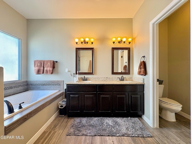 12217 Chapel Hill Rd, El Paso, TX 79928 - full bath featuring double vanity, a bath, and wood finished floors