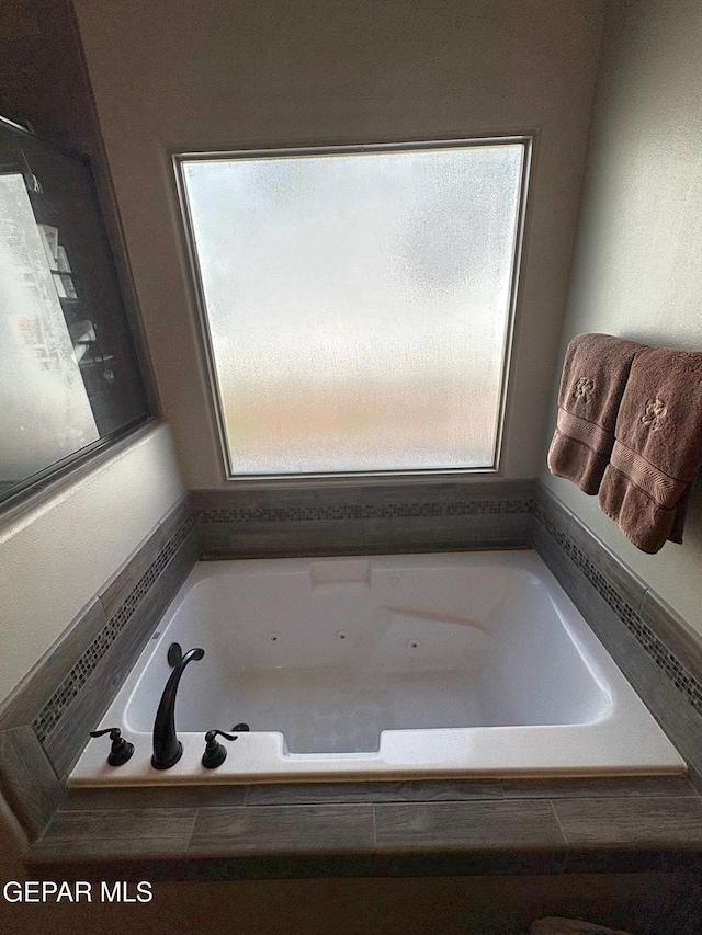 12217 Chapel Hill Rd, El Paso, TX 79928 - bathroom featuring a garden tub