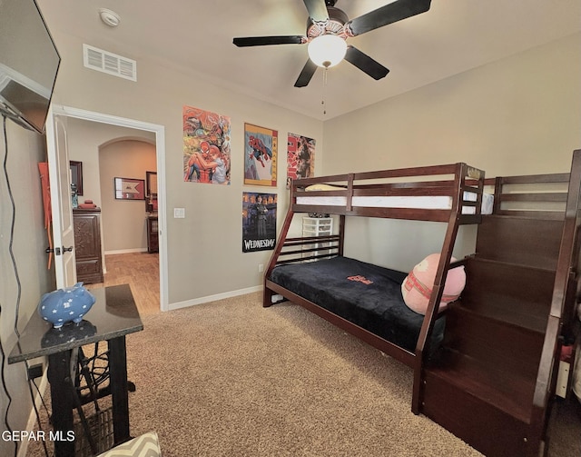 12217 Chapel Hill Rd, El Paso, TX 79928 - bedroom featuring carpet flooring, arched walkways, and ceiling fan