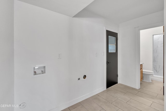 1460 Backus St, El Paso, TX 79925 - laundry room featuring washer hookup and baseboards