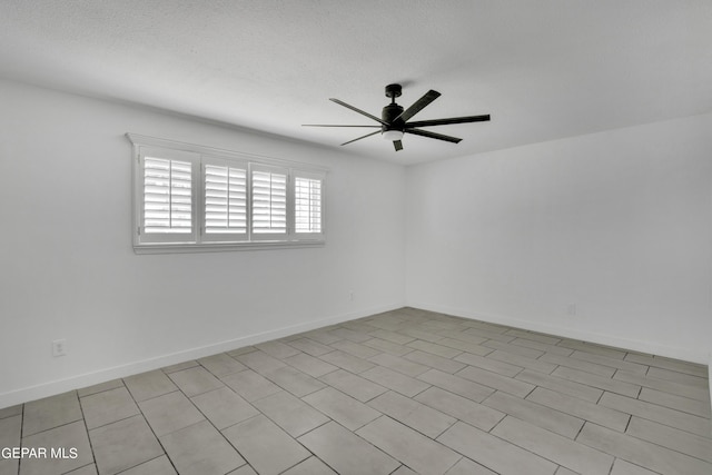1460 Backus St, El Paso, TX 79925 - empty room featuring ceiling fan, a textured ceiling, and baseboards