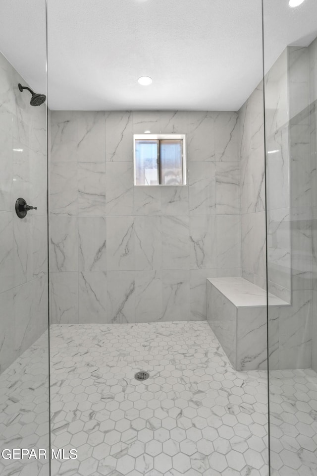 1460 Backus St, El Paso, TX 79925 - bathroom featuring a marble finish shower