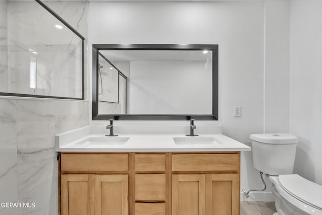 1460 Backus St, El Paso, TX 79925 - bathroom with toilet and double vanity