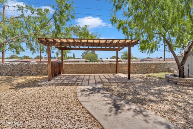 1460 Backus St, El Paso, TX 79925 - fenced backyard featuring a pergola and a patio area