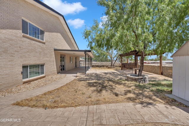 1460 Backus St, El Paso, TX 79925 - view of yard with a patio
