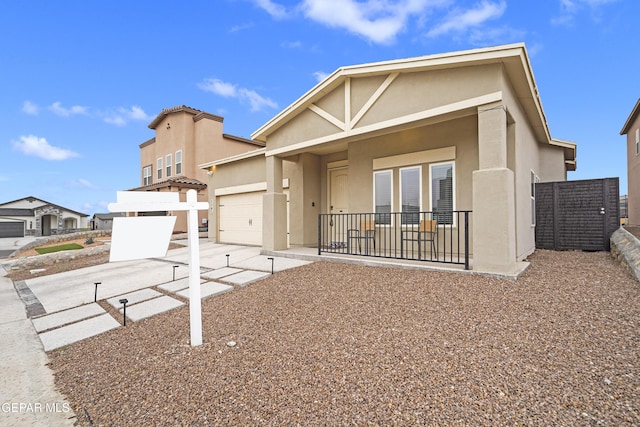 2305 Enchanted Quail, El Paso, TX 79911 - view of front of house with stucco siding, concrete driveway, and a garage