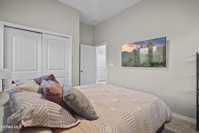 2305 Enchanted Quail, El Paso, TX 79911 - bedroom with a closet, carpet flooring, and lofted ceiling
