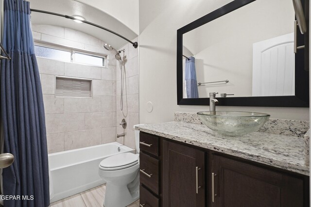2305 Enchanted Quail, El Paso, TX 79911 - bathroom featuring shower / bath combo with shower curtain and vanity
