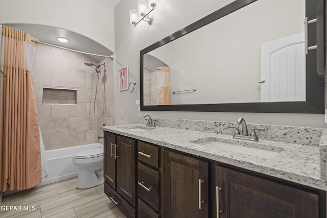 2305 Enchanted Quail, El Paso, TX 79911 - bathroom featuring shower / bath combo with shower curtain and double vanity