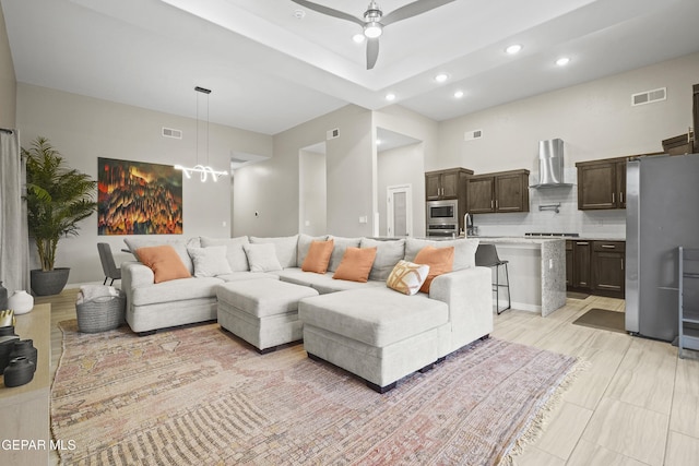 2305 Enchanted Quail, El Paso, TX 79911 - living room featuring recessed lighting, ceiling fan, and a chandelier