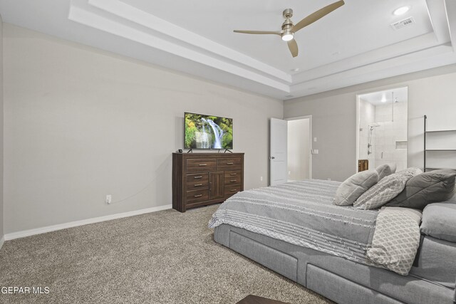 2305 Enchanted Quail, El Paso, TX 79911 - bedroom with a tray ceiling, carpet, a ceiling fan, and ensuite bathroom