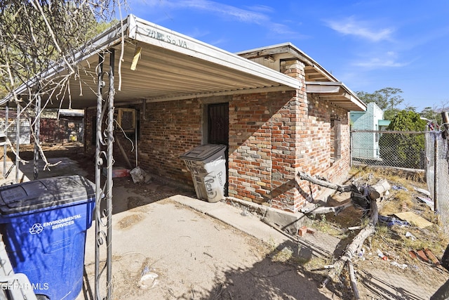 711 S Virginia St, El Paso, TX 79901 - view of side of home with brick siding