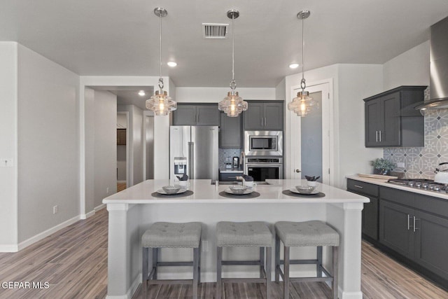 912 Pettus Pl, El Paso, TX 79928 - kitchen featuring stainless steel appliances, light countertops, decorative backsplash, and recessed lighting