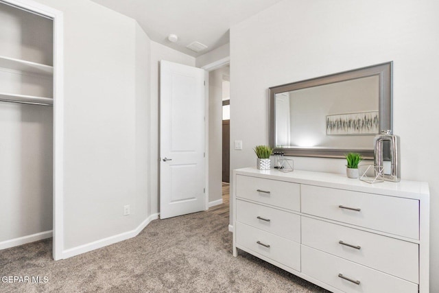 912 Pettus Pl, El Paso, TX 79928 - bedroom with light colored carpet, baseboards, and a closet
