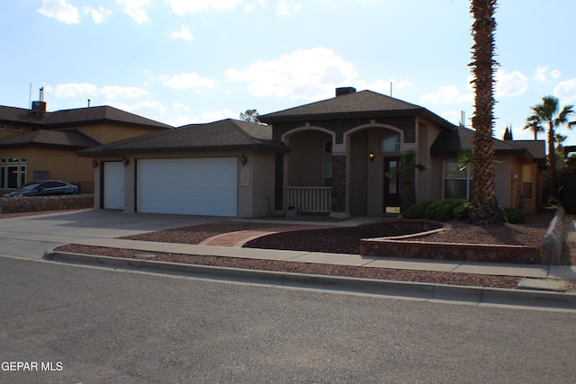 1429 Jettie Ray Way, El Paso, TX 79936 - ranch-style house featuring a garage, driveway, and stucco siding