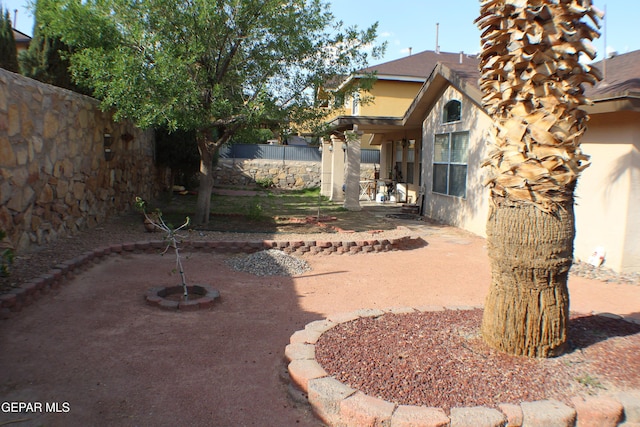 1429 Jettie Ray Way, El Paso, TX 79936 - fenced backyard featuring a patio
