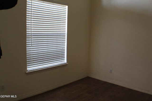 1429 Jettie Ray Way, El Paso, TX 79936 - empty room with dark wood-style flooring and baseboards