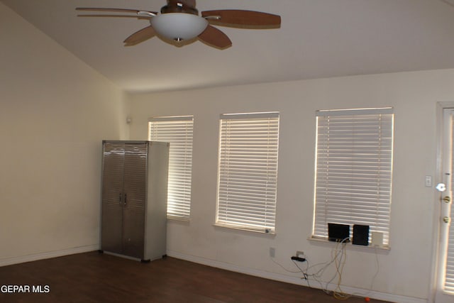1429 Jettie Ray Way, El Paso, TX 79936 - unfurnished bedroom with wood finished floors, baseboards, lofted ceiling, and a ceiling fan